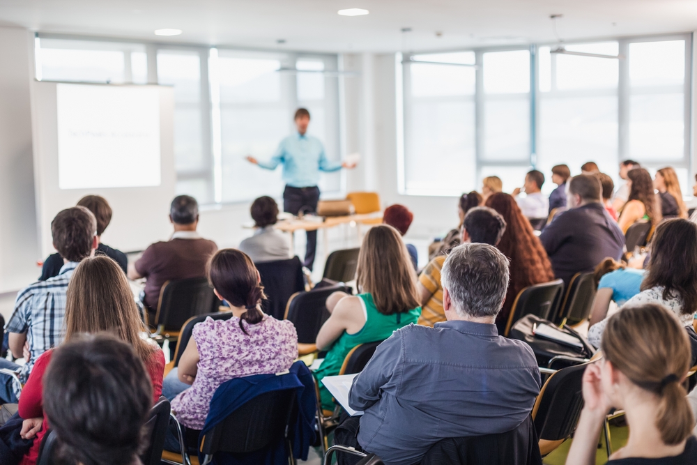 Business,And,Entrepreneurship,Symposium.,Speaker,Giving,A,Talk,At,Business Business,And,Entrepreneurship,Symposium.,Speaker,Giving,A,Talk,At,Business